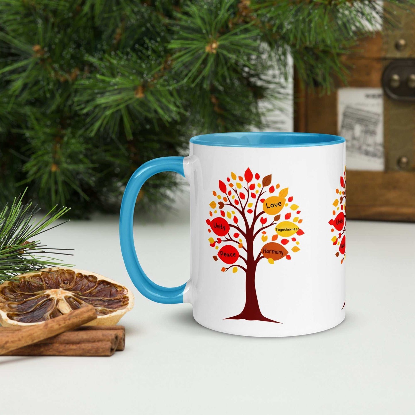 Thanksgiving Tree of Gifts mug with colored inside, featuring a tree with fall leaves and messages of love, unity, and gratitude; ceramic, dishwasher safe.