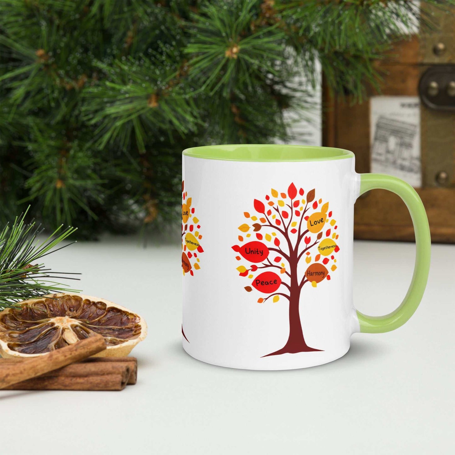 Thanksgiving mug with a tree design featuring Fall-colored leaves and messages of love, unity, and peace.