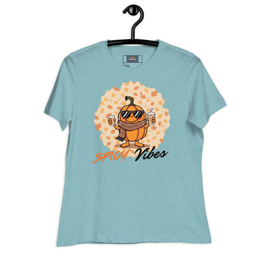 Image of a playful t-shirt featuring a cartoon pumpkin holding hot and cold pumpkin spice lattes with the "Spicy Vibes" tagline.