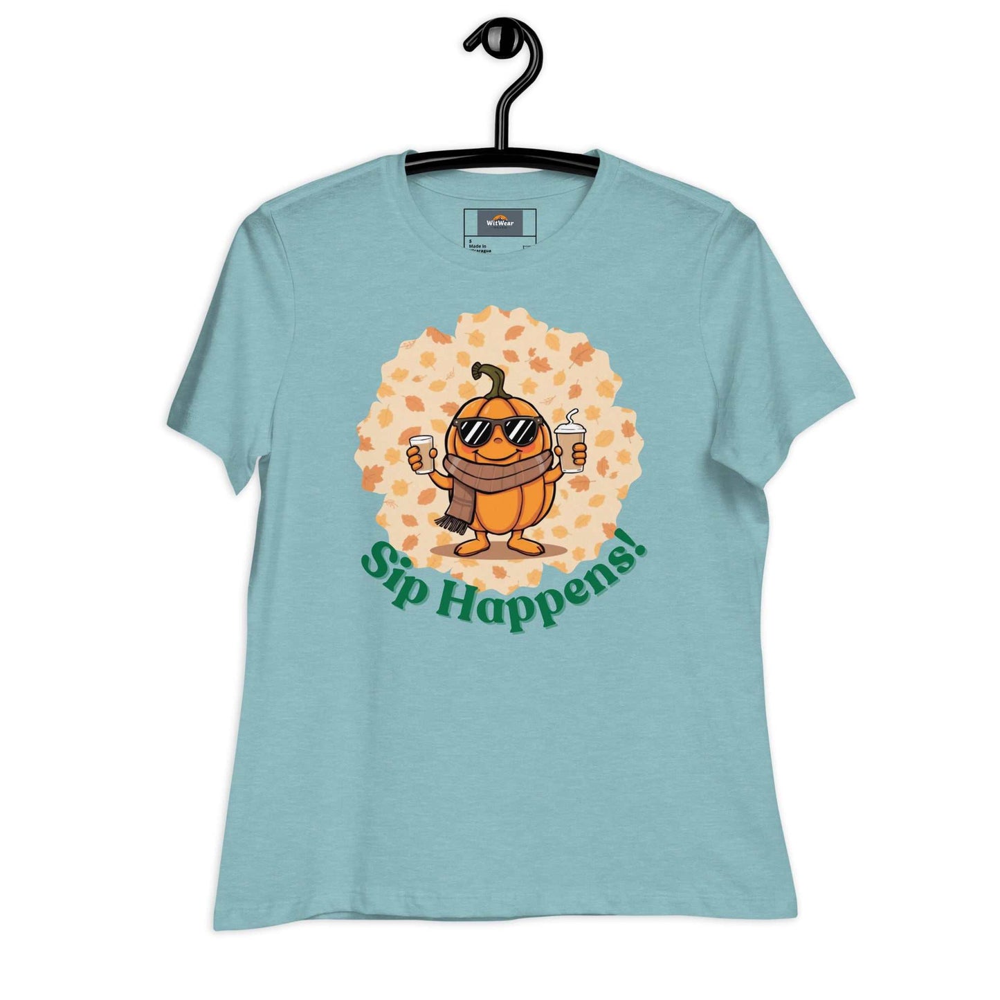 Image of a t-shirt with a cartoon pumpkin holding hot and cold Pumpkin Spice Latte T-Shirt, featuring the slogan "Sip Happens!" in playful font.