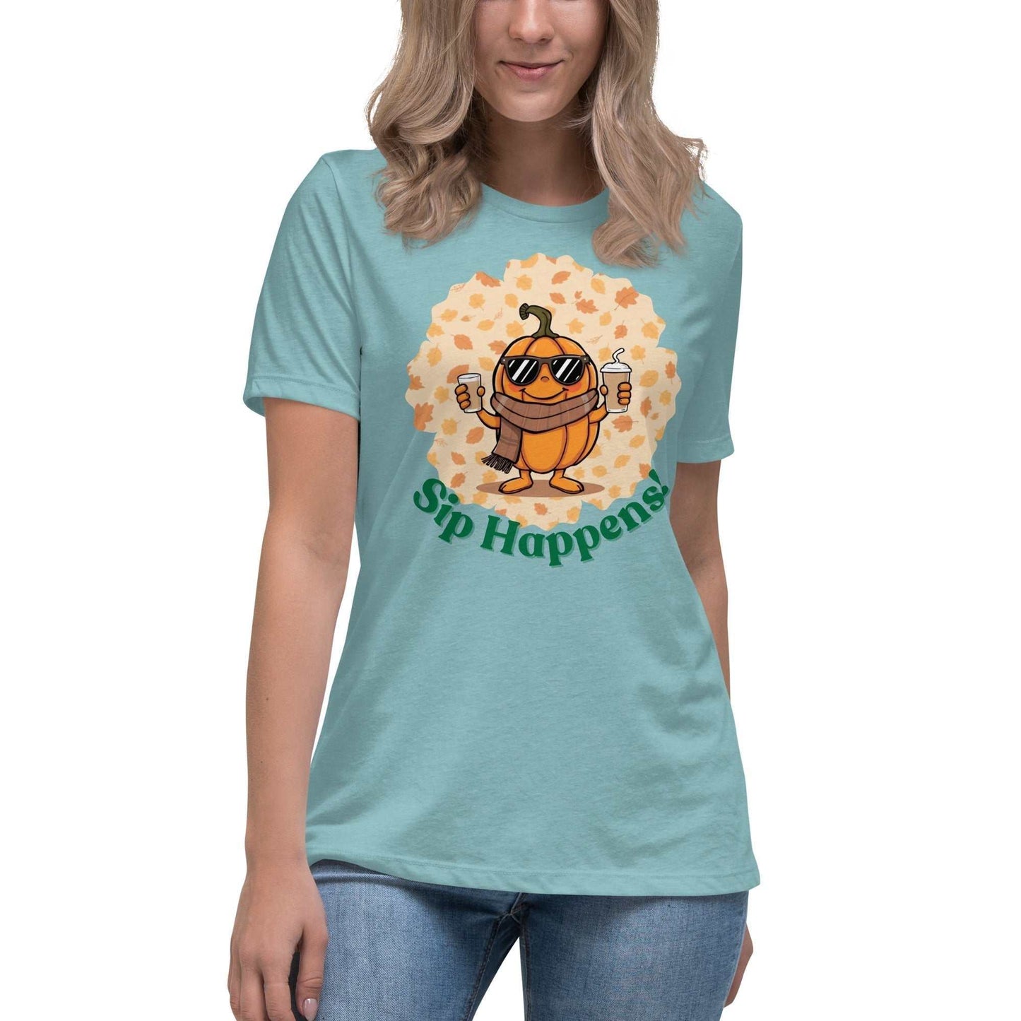 Image of a t-shirt with a cartoon pumpkin holding hot and cold Pumpkin Spice Latte T-Shirt, featuring the slogan "Sip Happens!" in playful font.