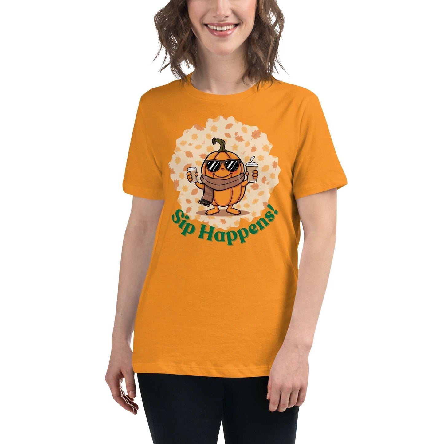 Image of a t-shirt with a cartoon pumpkin holding hot and cold Pumpkin Spice Latte T-Shirt, featuring the slogan "Sip Happens!" in playful font.