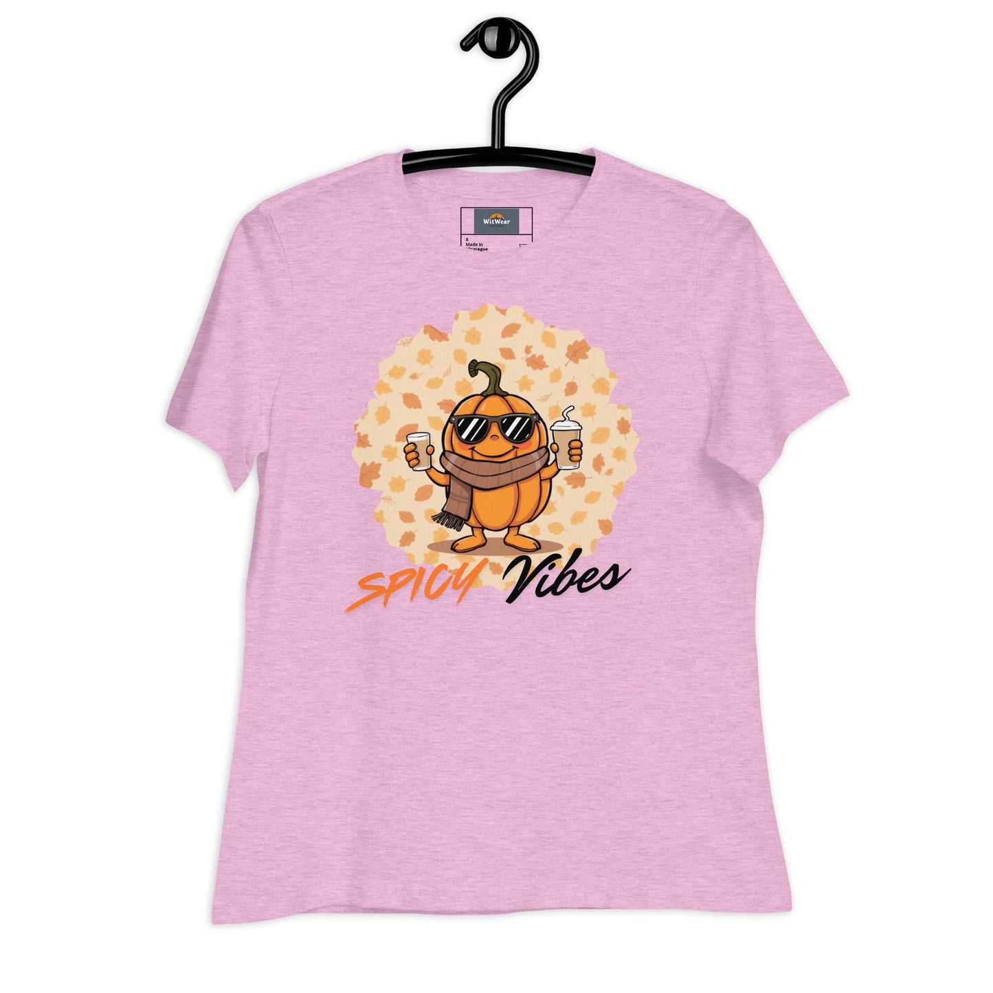 Image of a playful t-shirt featuring a cartoon pumpkin holding hot and cold pumpkin spice lattes with the "Spicy Vibes" tagline.