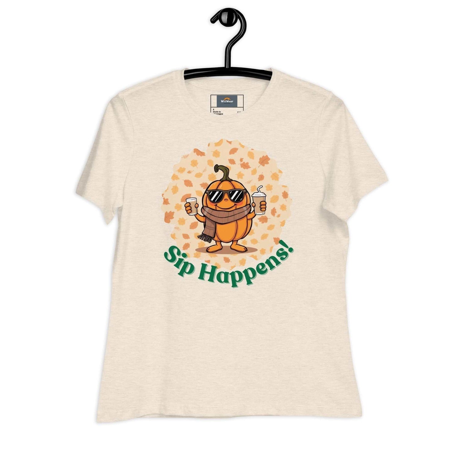 Image of a t-shirt with a cartoon pumpkin holding hot and cold Pumpkin Spice Latte T-Shirt, featuring the slogan "Sip Happens!" in playful font.