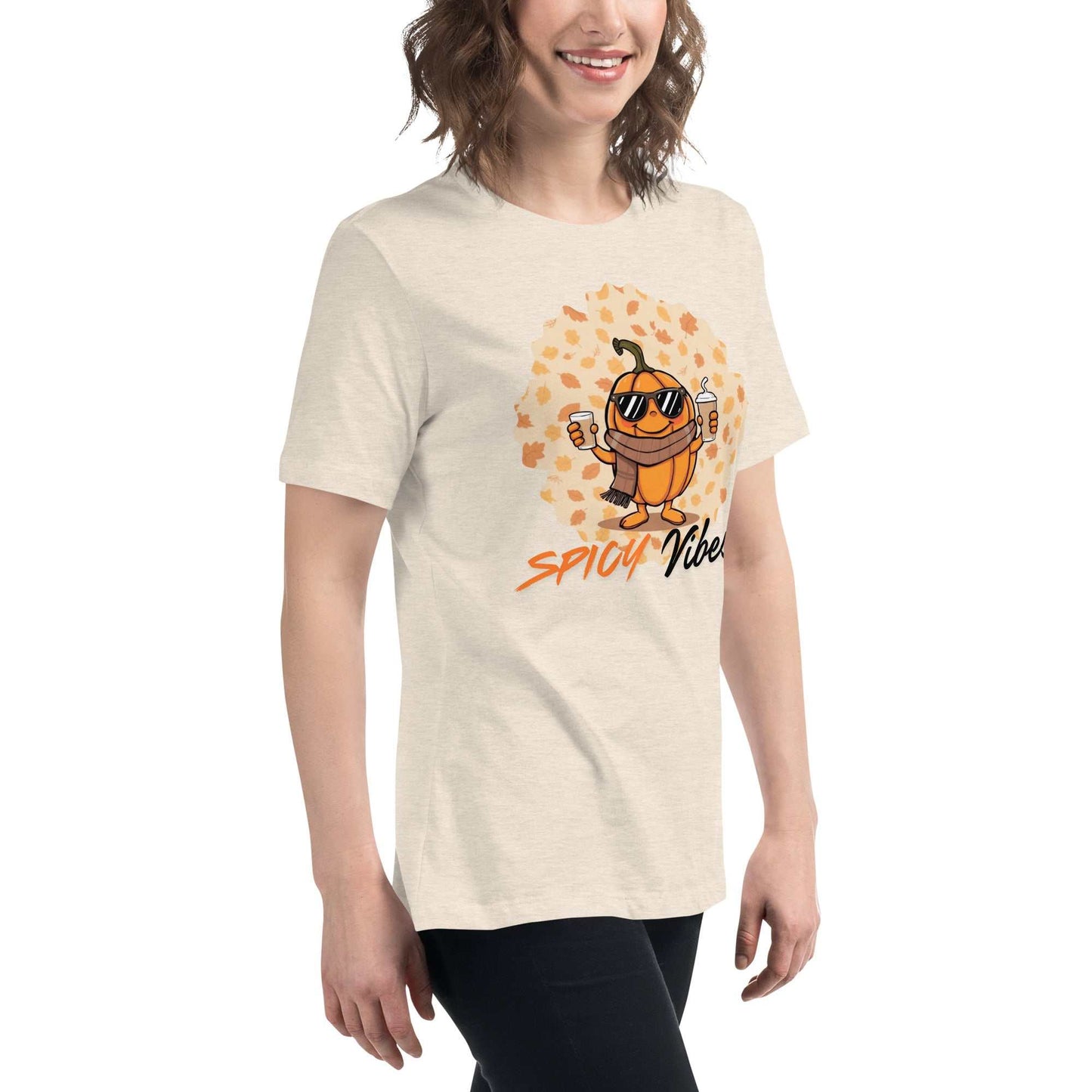 Image of a playful t-shirt featuring a cartoon pumpkin holding hot and cold pumpkin spice lattes with the "Spicy Vibes" tagline.