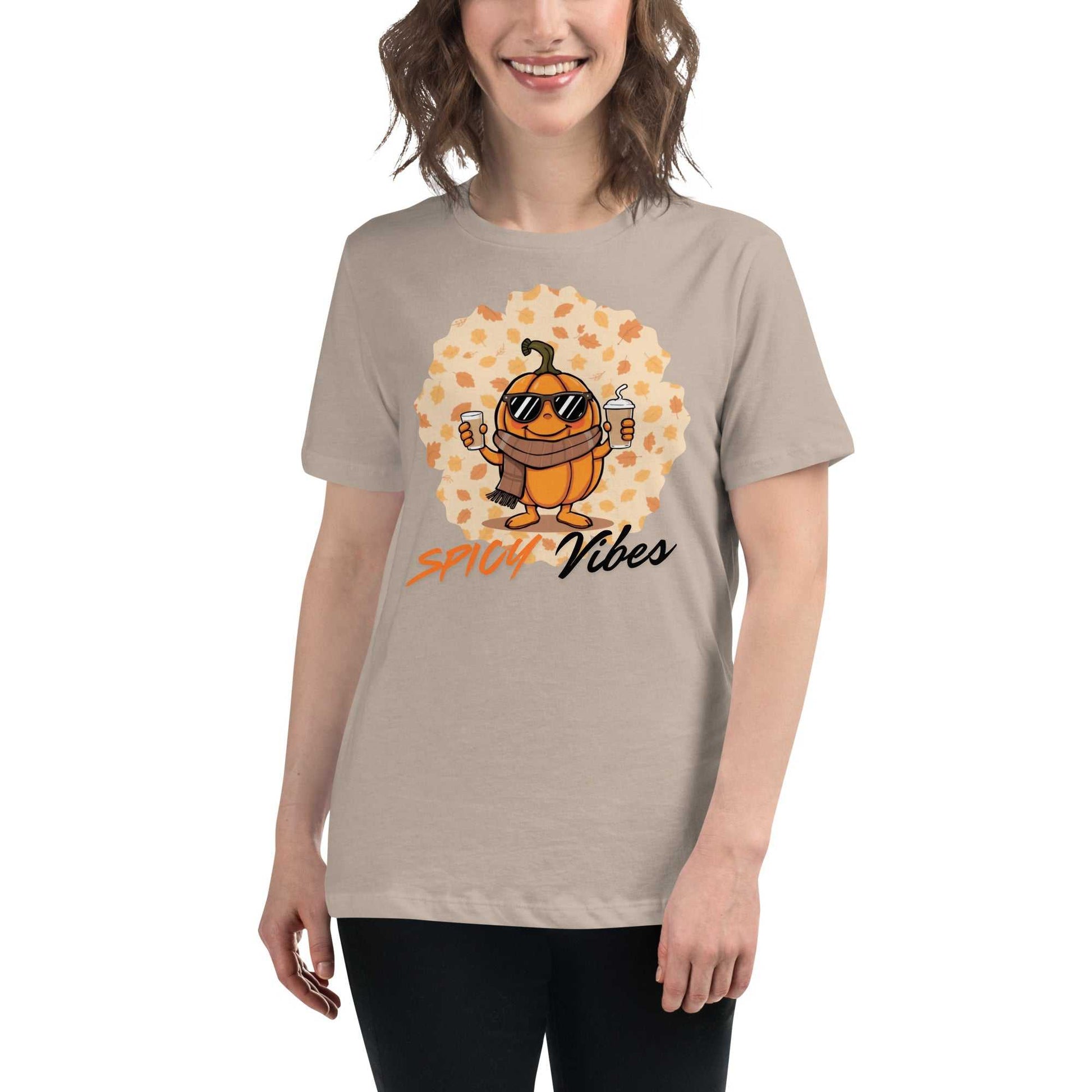 Image of a playful t-shirt featuring a cartoon pumpkin holding hot and cold pumpkin spice lattes with the "Spicy Vibes" tagline.