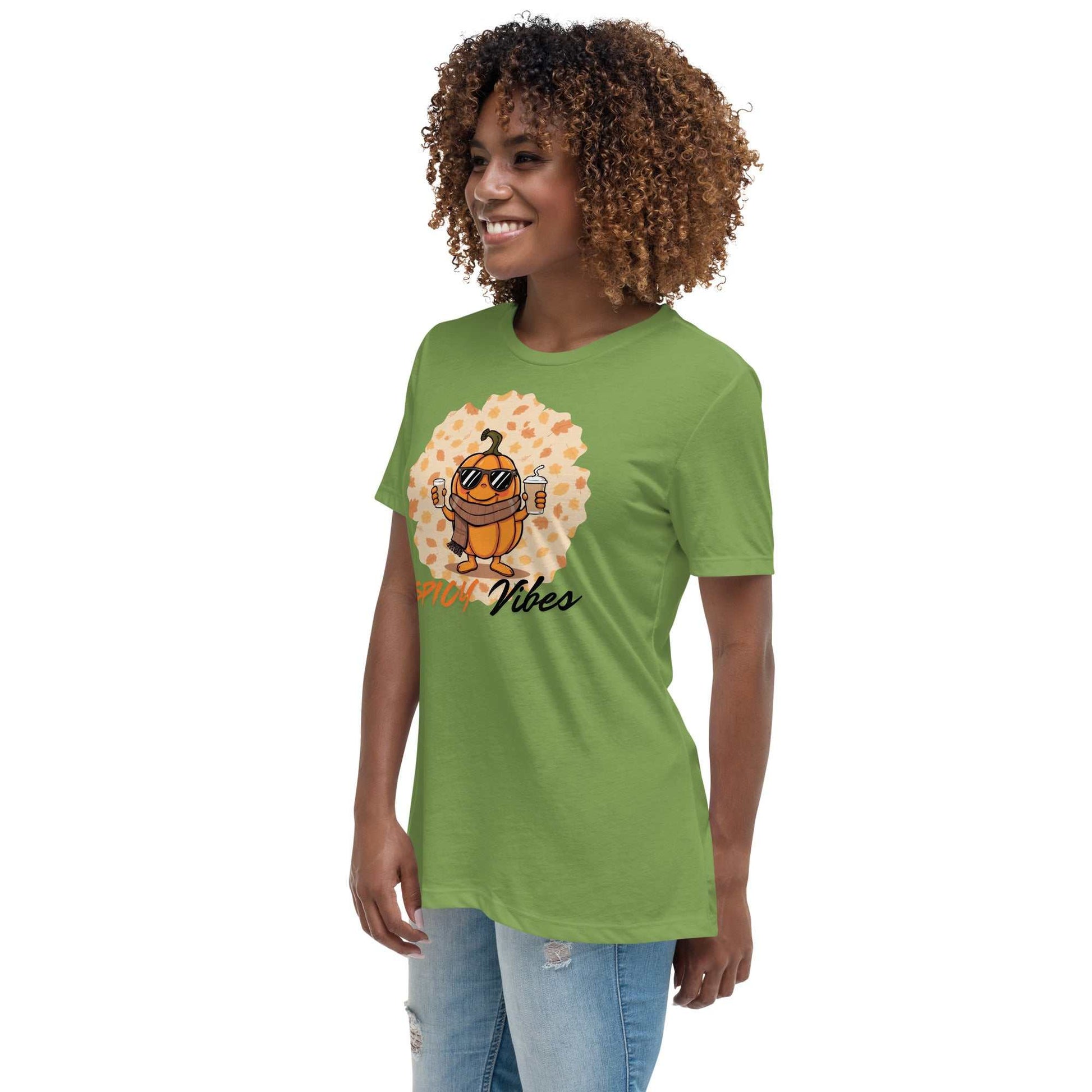 Image of a playful t-shirt featuring a cartoon pumpkin holding hot and cold pumpkin spice lattes with the "Spicy Vibes" tagline.