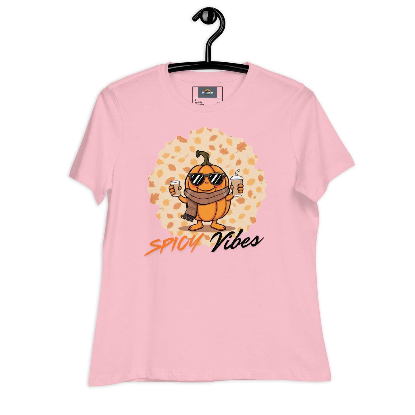 Image of a playful t-shirt featuring a cartoon pumpkin holding hot and cold pumpkin spice lattes with the "Spicy Vibes" tagline.