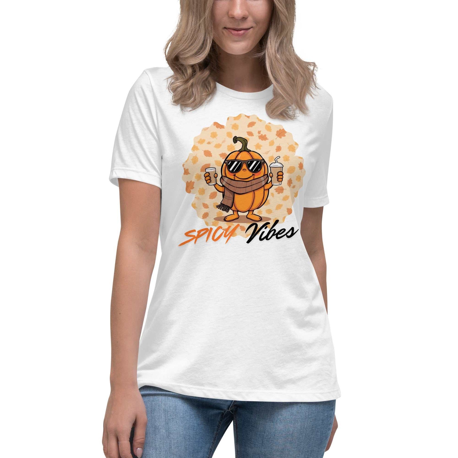 Image of a playful t-shirt featuring a cartoon pumpkin holding hot and cold pumpkin spice lattes with the "Spicy Vibes" tagline.